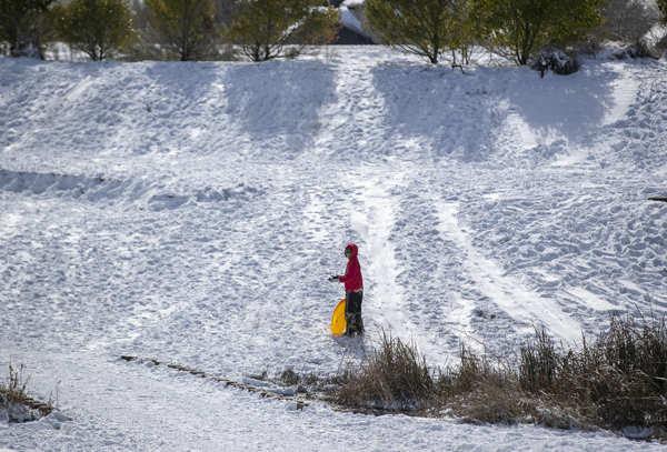 At least 21 dead as snowstorm slams US