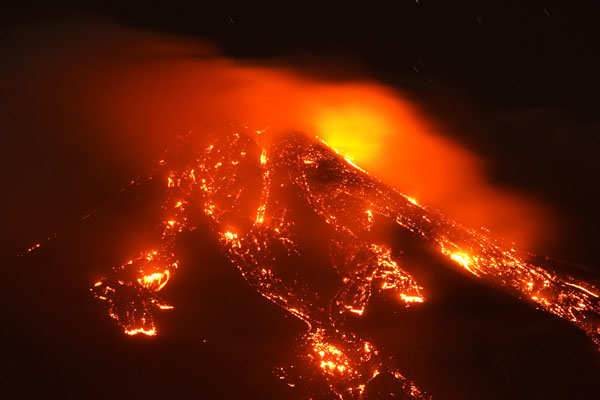 Lava and ash spew from Italy's Mount Etna
