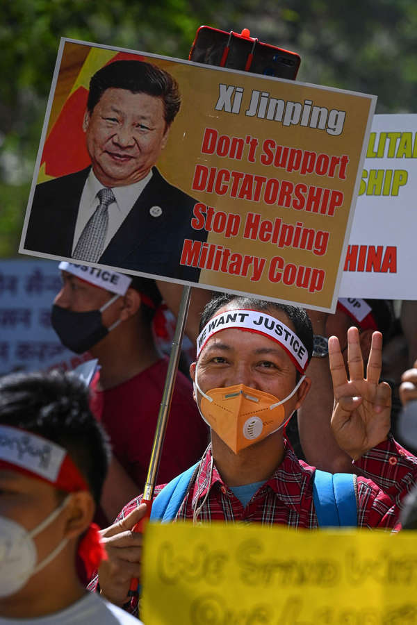 Myanmar refugees hold protest against military coup