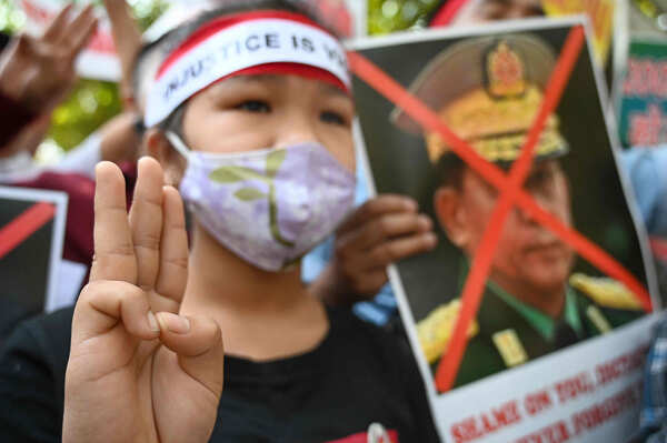 Myanmar refugees hold protest against military coup