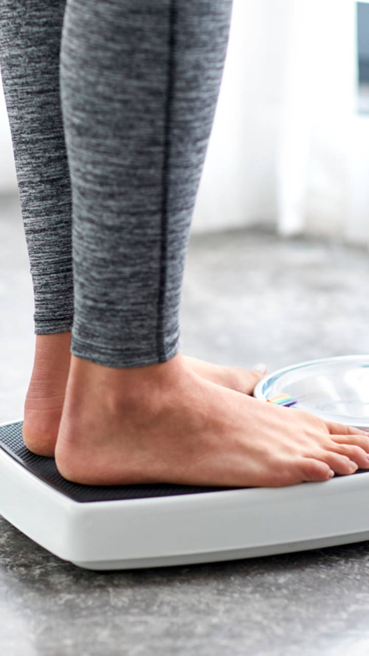 The number of times you should weigh yourself to lose weight - Times of  India