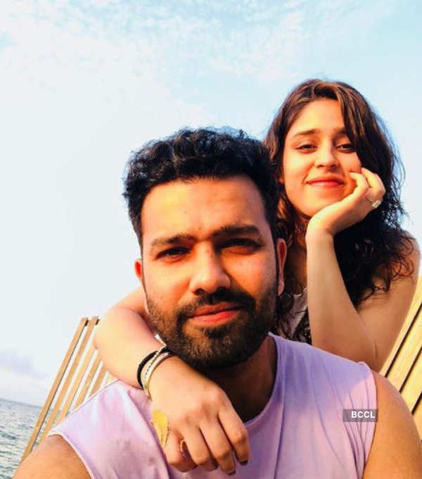 Cricketer Rohit Sharma and his wife's loved-up pictures go viral