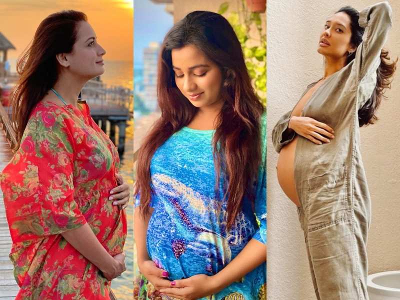 bollywood pregnancy photoshoot in saree