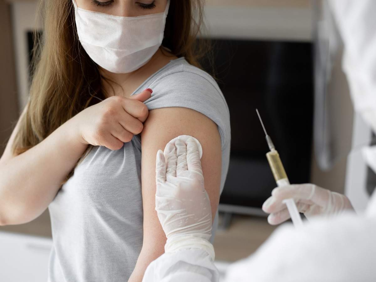 Coronavirus vaccine: 4 side effects women can experience from the COVID jab  | The Times of India