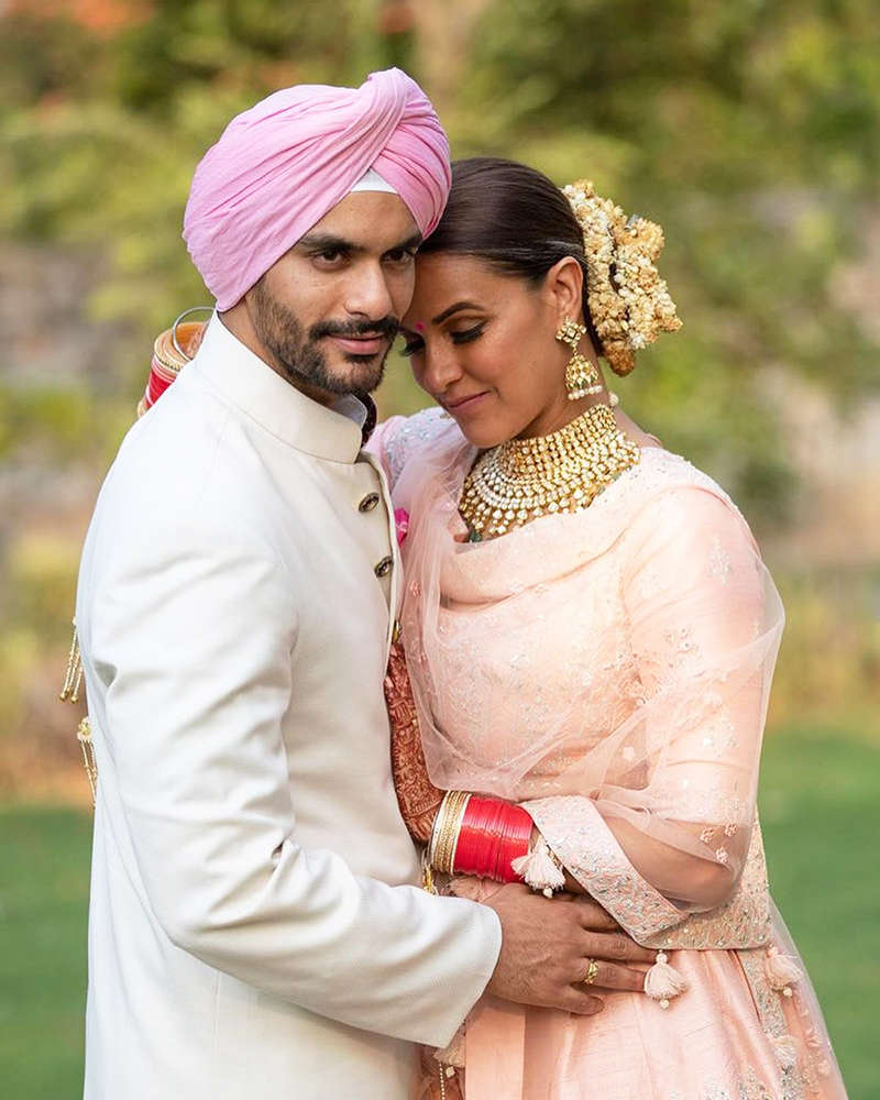 Mommy-to-be Neha Dhupia flaunts her baby bump in these new pictures