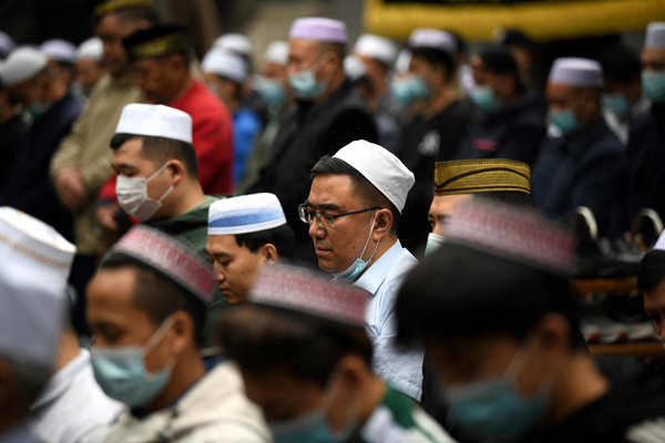 Muslims celebrate Eid amid Covid-19 measures
