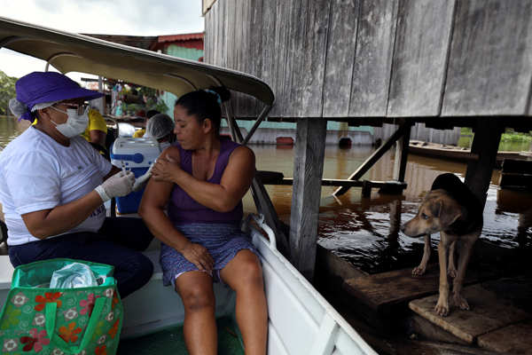 Pictures of unusual COVID vaccination venues