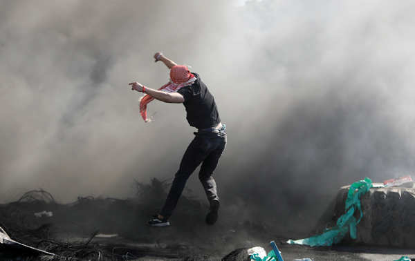 These images show the violence flares in West Bank amid aerial bombardments