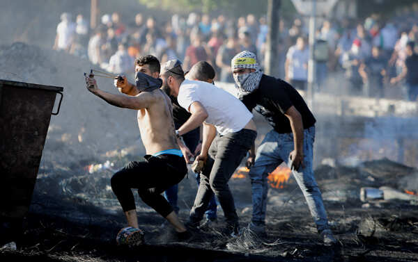 These images show the violence flares in West Bank amid aerial bombardments