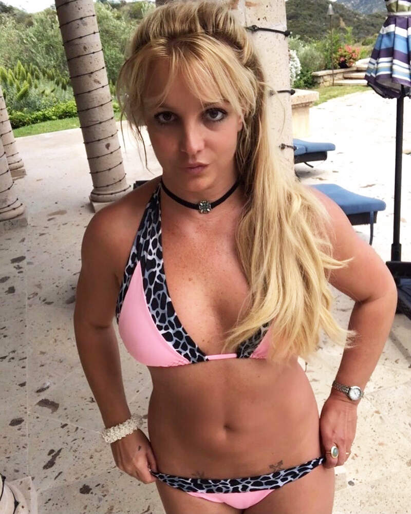 Britney Spears is teasing fans with a throwback pool picture with little kids