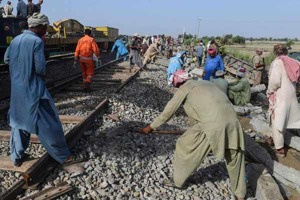 At least 65 killed as passenger trains collide in Pakistan