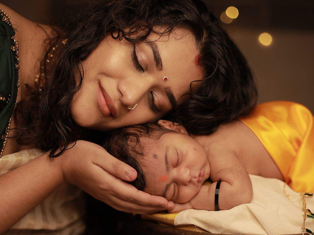 Here are some cute pictures of Parvathy Krishna's baby boy Avyukth ...