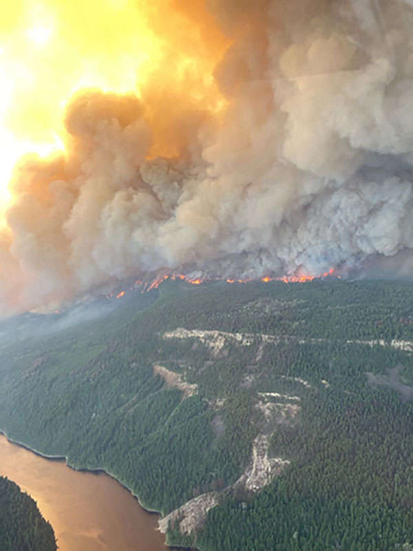 Wildfires rage amid record-breaking heatwave in Canada and California