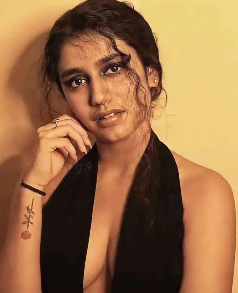 ‘Wink Girl’ Priya Prakash Varrier stuns internet in a black dress with a plunging neckline for a photoshoot