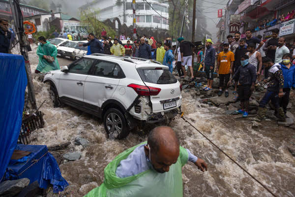 These pictures show how flash floods wreaked havoc in Himachal