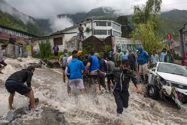 These pictures show how flash floods wreaked havoc in Himachal