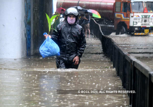 These pictures show how the heavy rains disrupted normal life in several parts of India