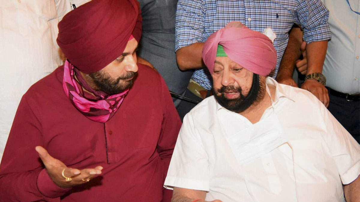 Photos: Flanked by Captain, Sidhu takes charge of Punjab Cong