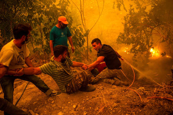 Harrowing pictures from Greece as wildfires engulf huge swathes of land