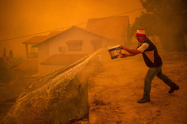 Harrowing pictures from Greece as wildfires engulf huge swathes of land