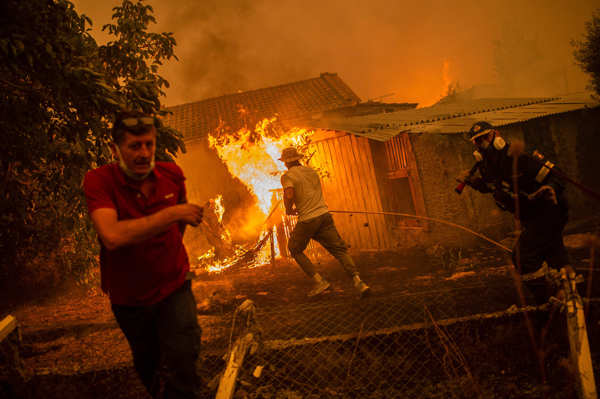 Harrowing pictures from Greece as wildfires engulf huge swathes of land