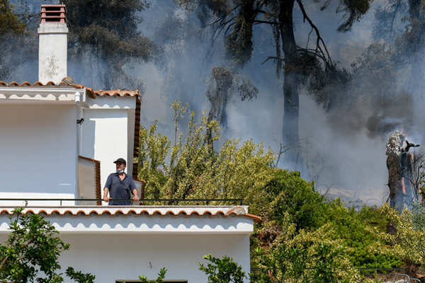 Harrowing pictures from Greece as wildfires engulf huge swathes of land