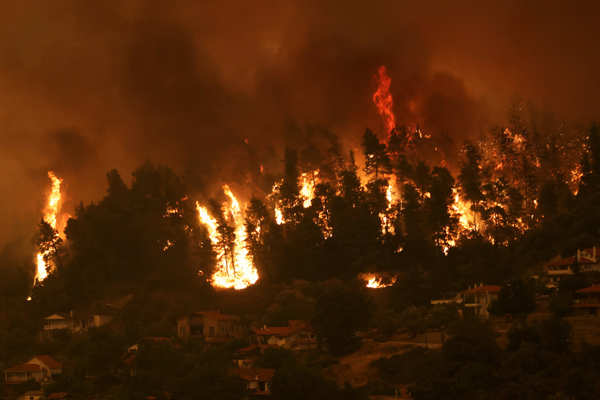 Harrowing pictures from Greece as wildfires engulf huge swathes of land