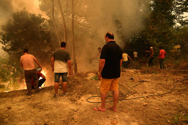 Harrowing pictures from Greece as wildfires engulf huge swathes of land