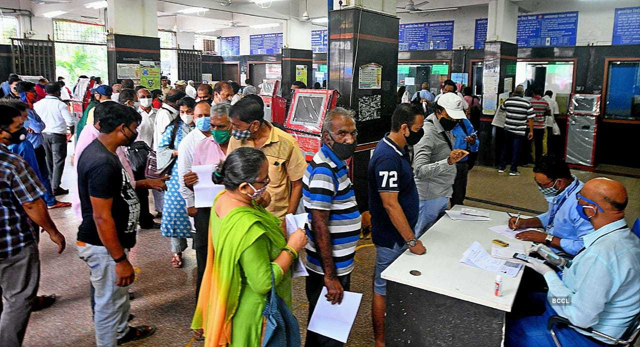 In photos: Mumbaikars get local train passes