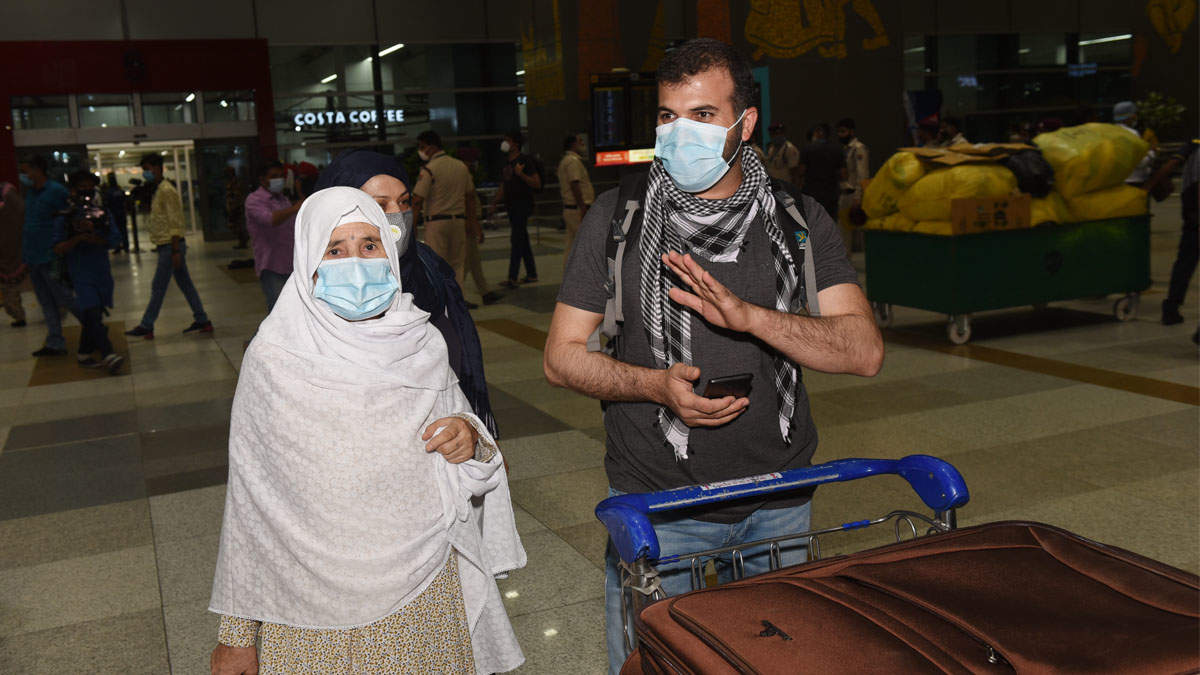 Photos: Indians, Afghans land in Delhi as Taliban storm Kabul