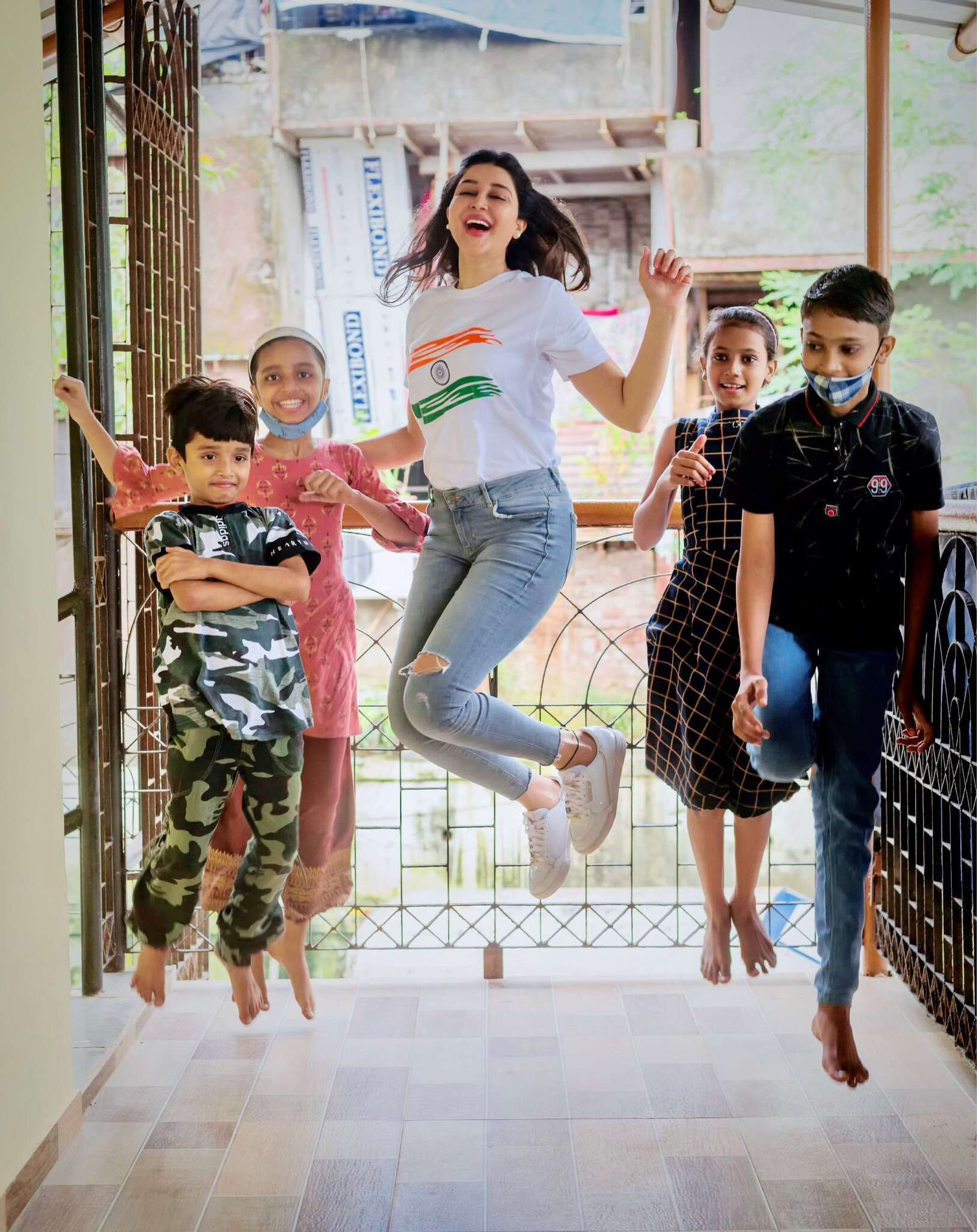 Pictures of Mishika Chourasia celebrating Independence Day with children