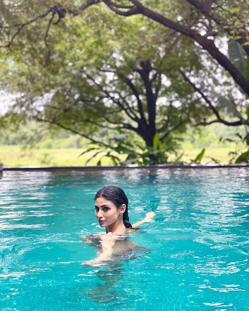 Netizens go gaga as Mouni Roy shares breathtaking sun-soaked pictures from the beach