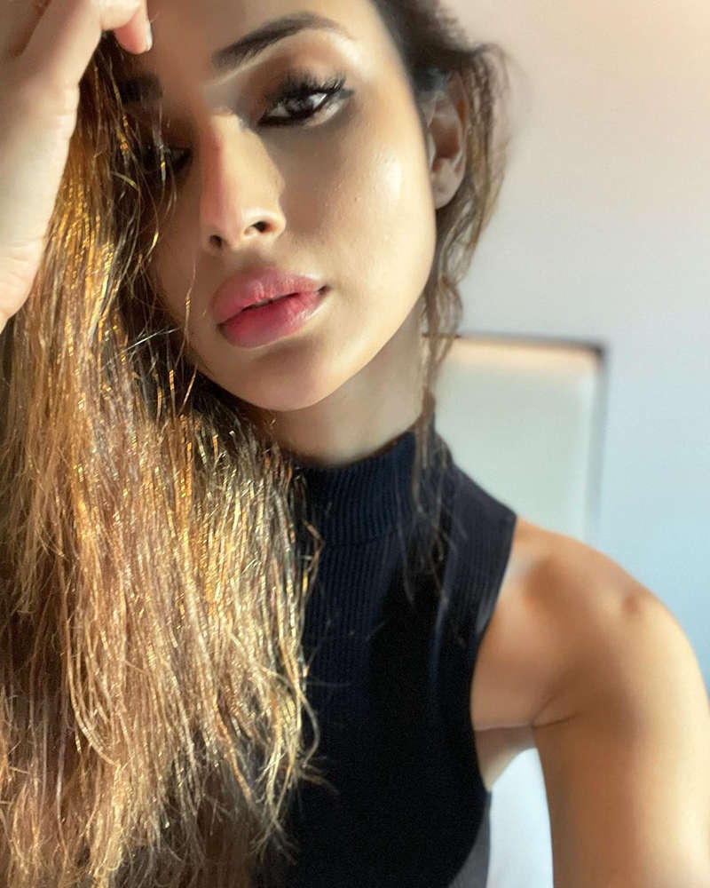 Netizens go gaga as Mouni Roy shares breathtaking sun-soaked pictures from the beach