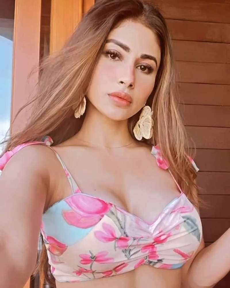 Netizens go gaga as Mouni Roy shares breathtaking sun-soaked pictures from the beach