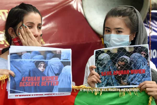 In pics: Afghan nationals protest at UNHCR office in Delhi