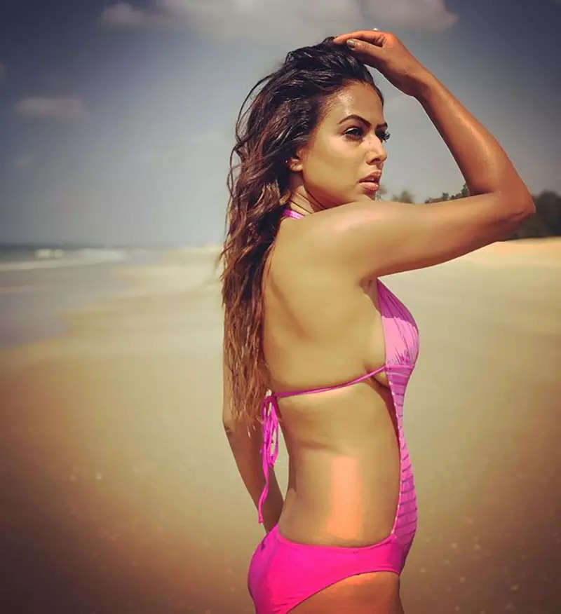 Nia Sharma’s latest pictures in a tube top are nothing short of a style statement