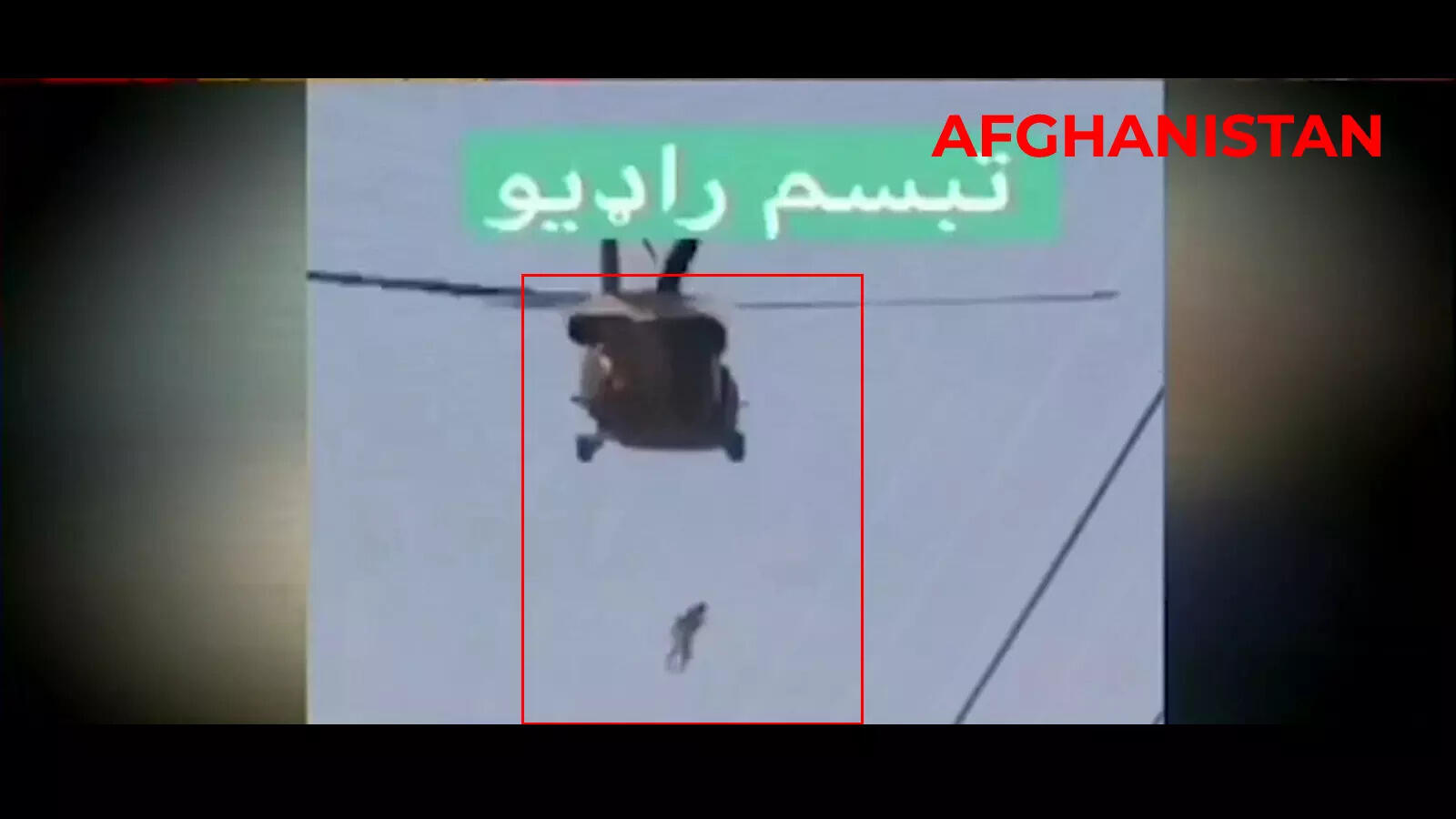 viral video: Shocking: Man was seen hanging from a helicopter in ...