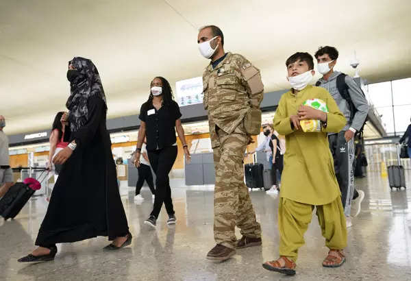 25 pictures of evacuated Afghans who arrived in US