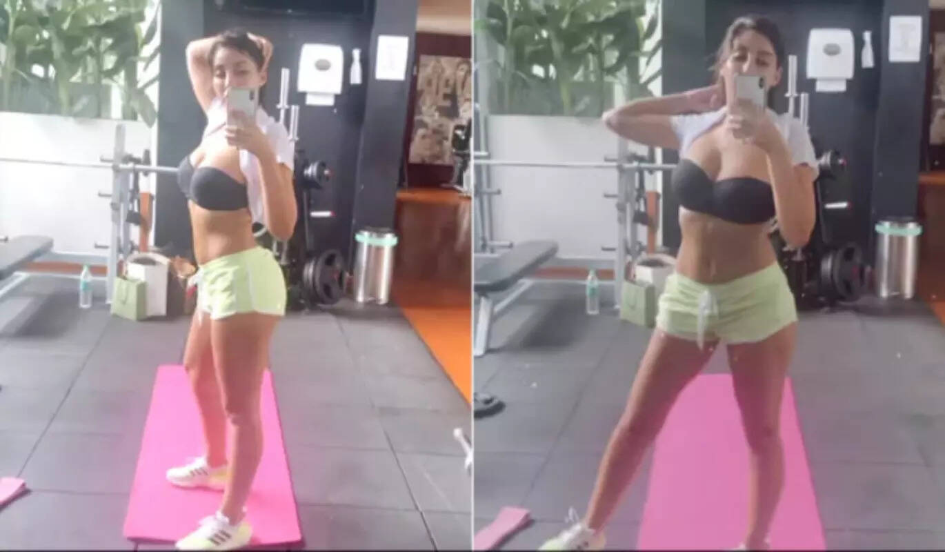 Nora Fatehi flaunts her washboard-abs in sports bra and shorts as she sweats it out in style