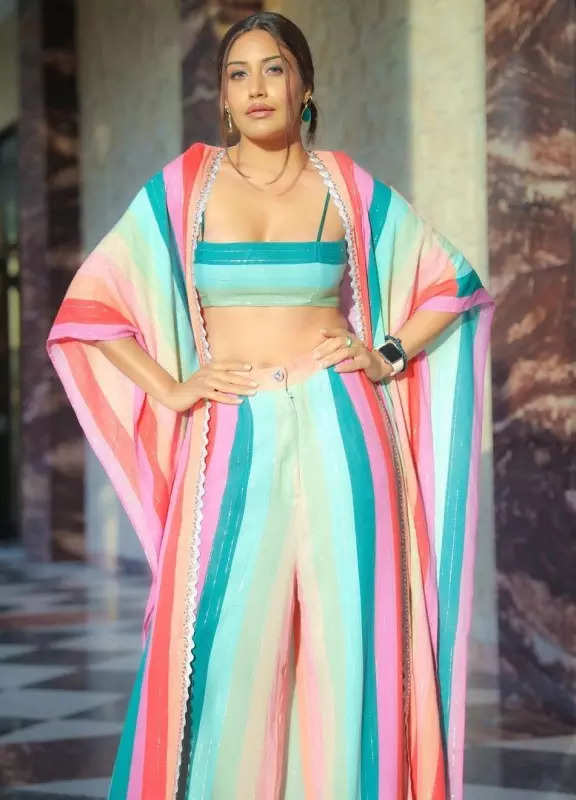 Surbhi Chandna looks sensational in a candy-hued bralette top, flared pants and oversized shrug, pictures will leave you speechless!
