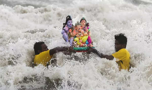 Ganeshotsav 2021: Devotees immerse idols of Lord Ganesha in water