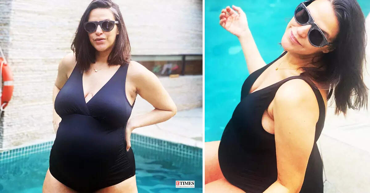 Swimsuit-clad Neha Dhupia flaunts her baby bump in these new pool pictures