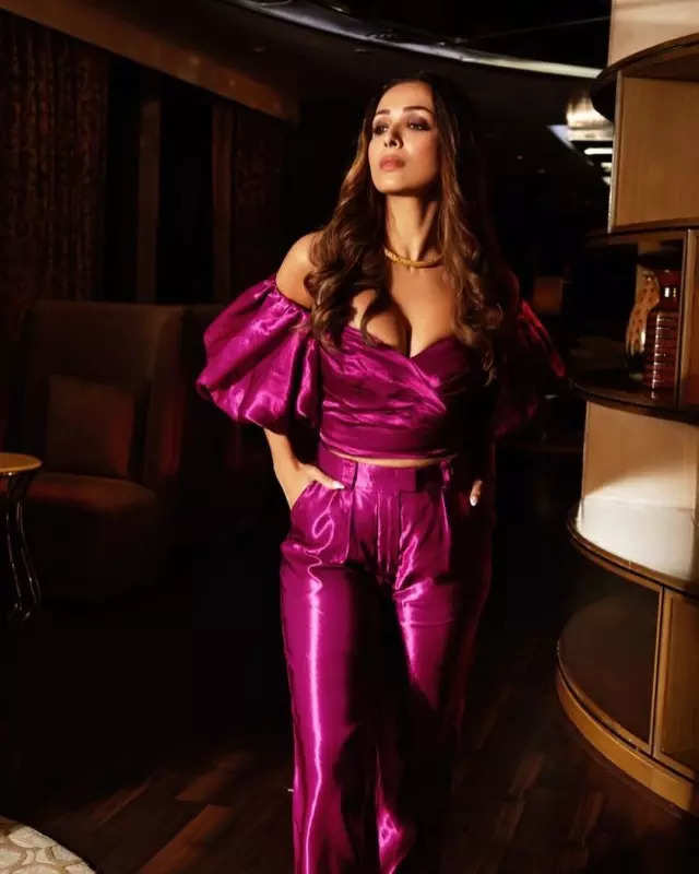 Malaika Arora exudes oomph in a bright metallic purple jumpsuit, stylish photos will make you go gaga over her look!