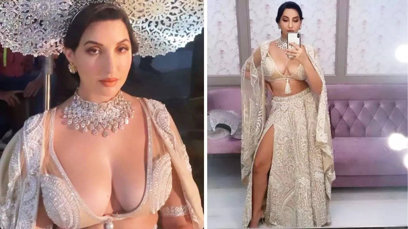 New pictures of Nora Fatehi in a thigh-high slit lehenga with a plunging neckline bralette prove she is effortlessly glamorous