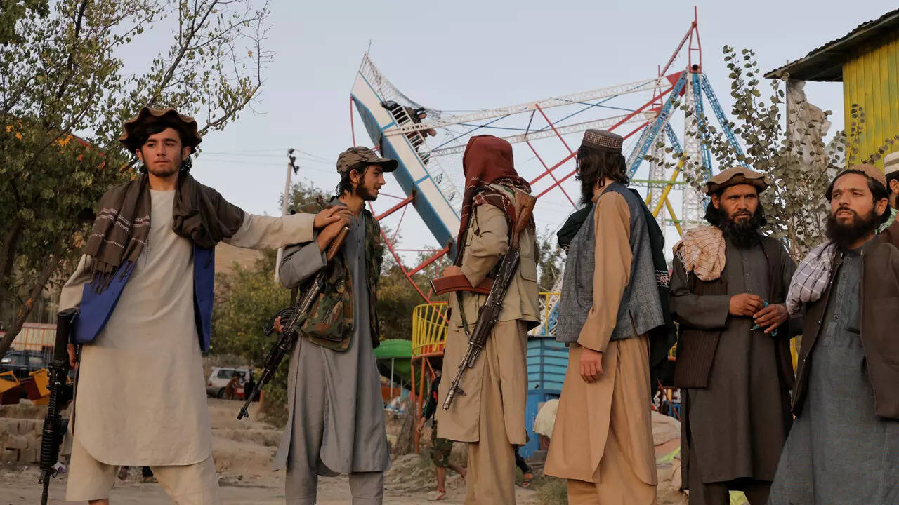 In pics: Taliban fighters enjoy day off at amusement park