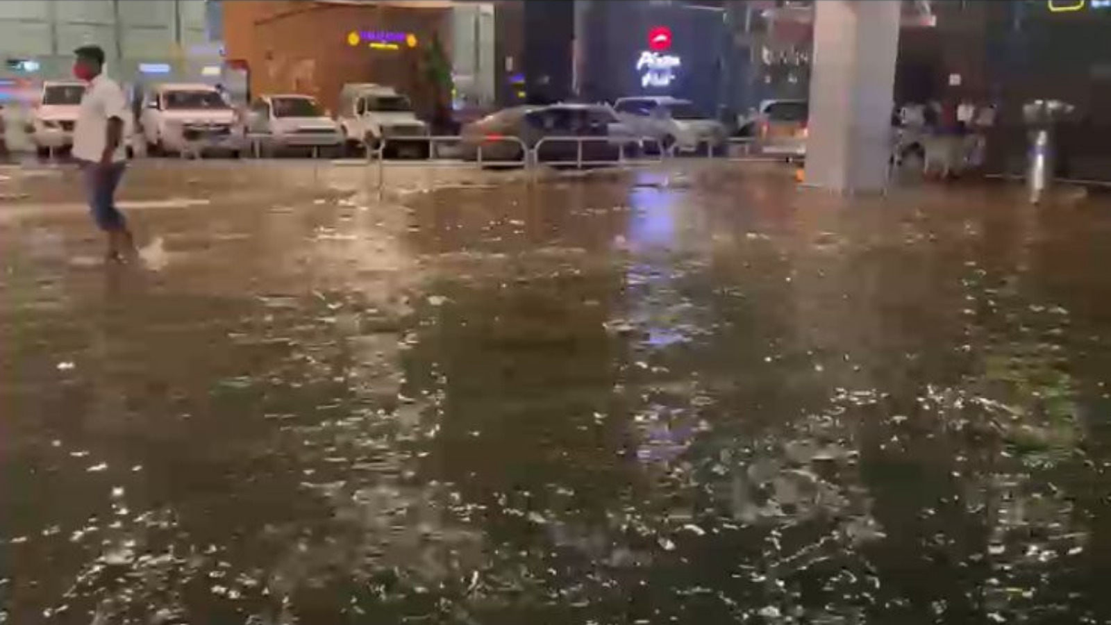 Photos: Bengaluru airport flooded, flyers use tractors