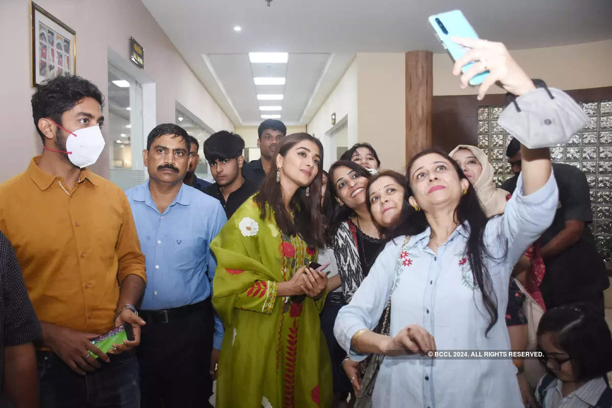 Pooja Hegde launches a campaign at WCSO Women Power Line 1090