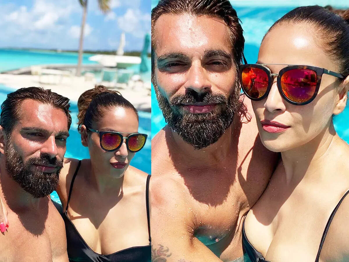 Bipasha Basu stuns in a black bikini; treats fans with drool-worthy beach vacation pictures