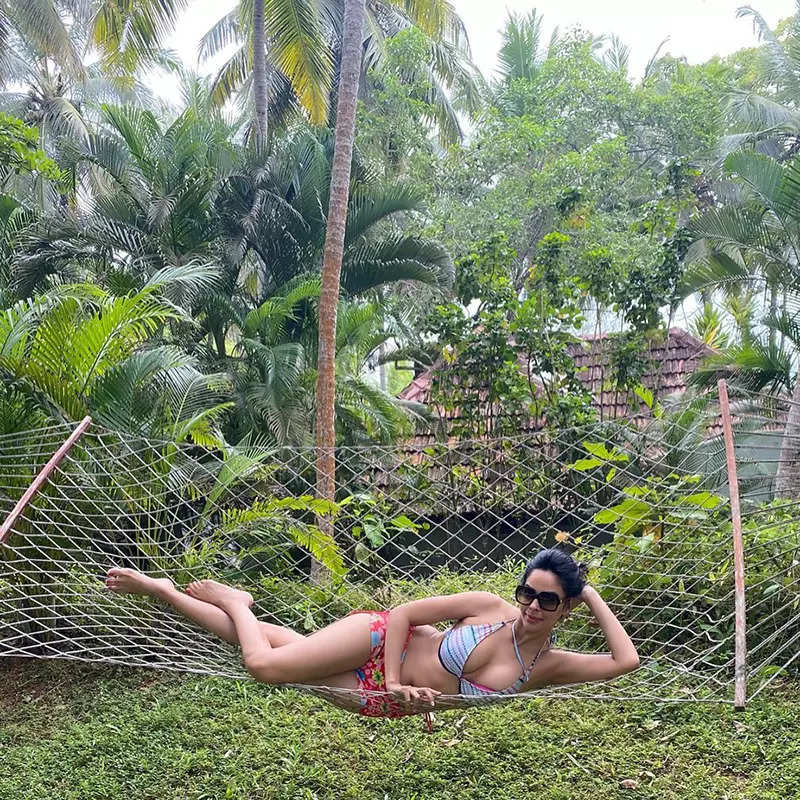 Mallika Sherawat flaunts her toned body in a yellow bikini in these new pictures; fans can’t stop drooling