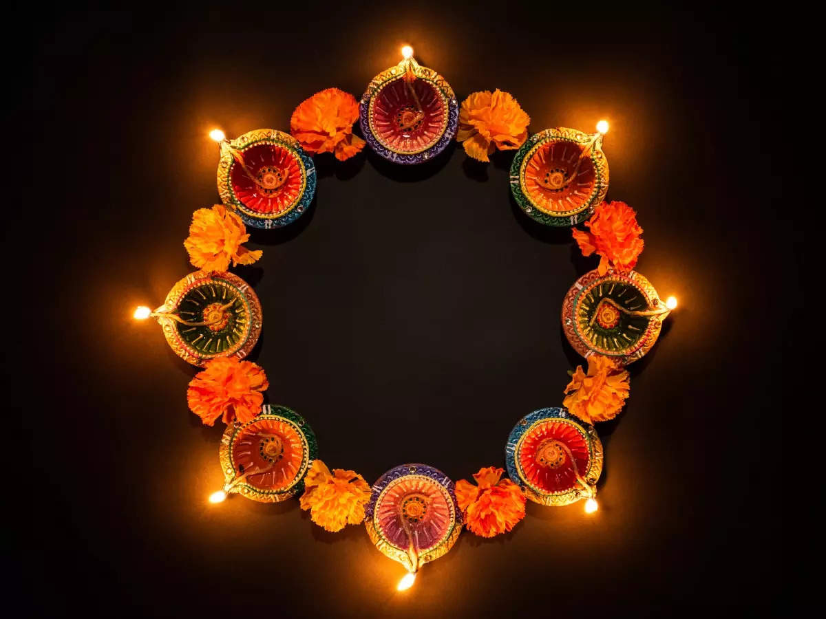 Diwali Rangoli Designs: Flower and diya rangoli